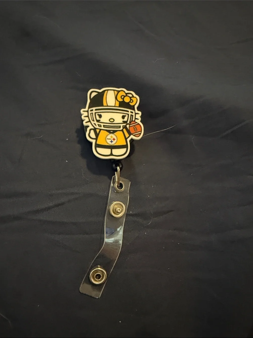 Hello Kitty x Steelers Yellow Badge Reel - Accessories